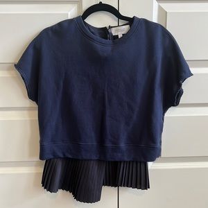 Derek Lam navy sweatshirt/accordion tank combo.